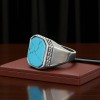 МУЖСКОЕ СЕРЕБРЯНОЕ КОЛЬЦО 925 ПРОБЫ С КАМНЕМ БИРЮЗА